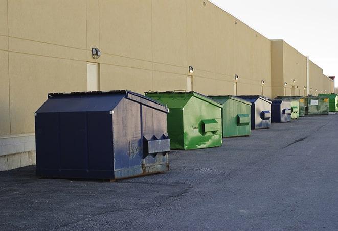 durable metal construction dumpster in use in Hamlin